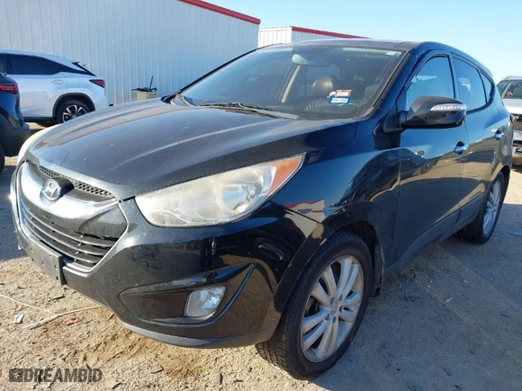2013 Hyundai Tucson GLS with VIN KM8JU3AC4DU616121, listed as a IAAI auction lot 41284719 with 154,406 mi miles. Bid and sale history available at carsss.com. Image 2.