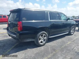 2017 Chevrolet Suburban Premier with VIN 1GNSCJKC4HR127667, listed as a IAAI auction lot 41936945 with 139,006 mi miles. Bid and sale history available at carsss.com. Image 4.