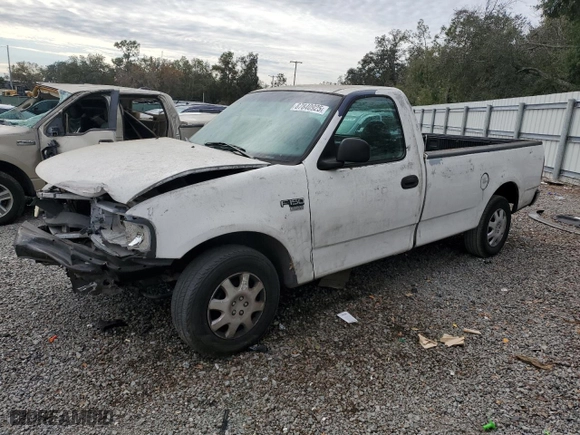 1999 Ford F-150 Work Series with VIN 1FTRF17W0XNB79739, listed as a Copart auction lot 87840925 with 0 mi miles and Salvage Title. Bid and sale history available at carsss.com. Image 1.