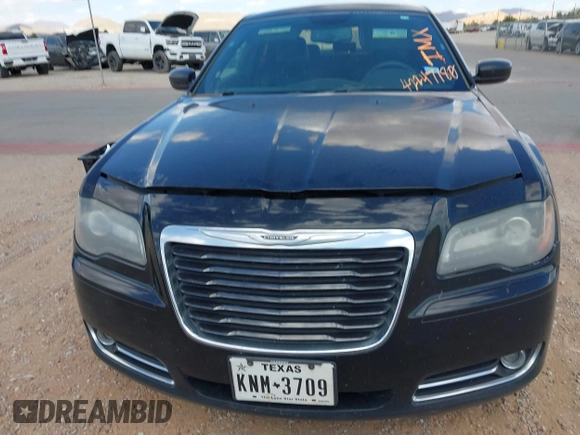 2014 Chrysler 300 S with VIN 2C3CCABG5EH205020, listed as a IAAI auction lot 42247180 with 186,458 mi miles and . Bid and sale history available at DreamBid. Image 11.