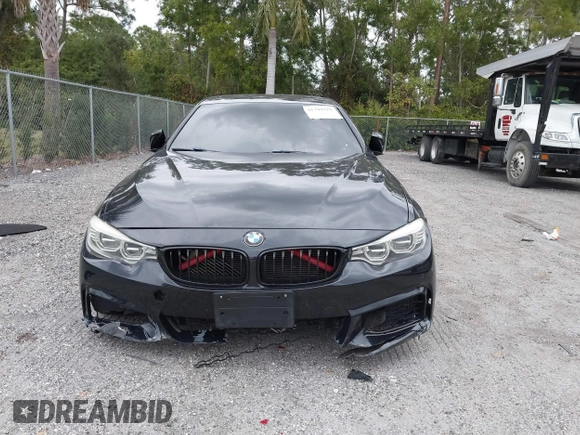 2015 BMW 4 Series 435i with VIN WBA4B1C5XFD955119, listed as a IAAI auction lot 41349918 with 181,937 mi miles and . Bid and sale history available at carsss.com. Image 13.