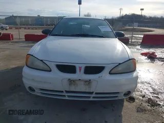 2004 Pontiac Grand Am SE1 with VIN 1G2NF52E44C248920, listed as a IAAI auction lot 41654124 with 158,656 mi miles. Bid and sale history available at carsss.com. Image 12.