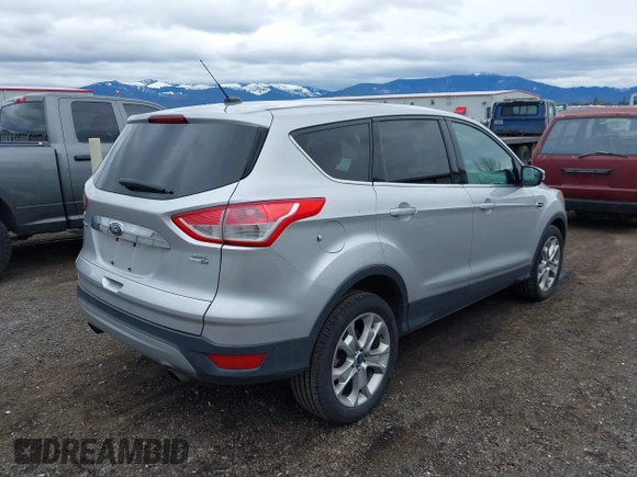 2013 Ford Escape SEL with VIN 1FMCU9H93DUD70670, listed as a IAAI auction lot 41867784 with 207,956 mi miles. Bid and sale history available at carsss.com. Image 4.