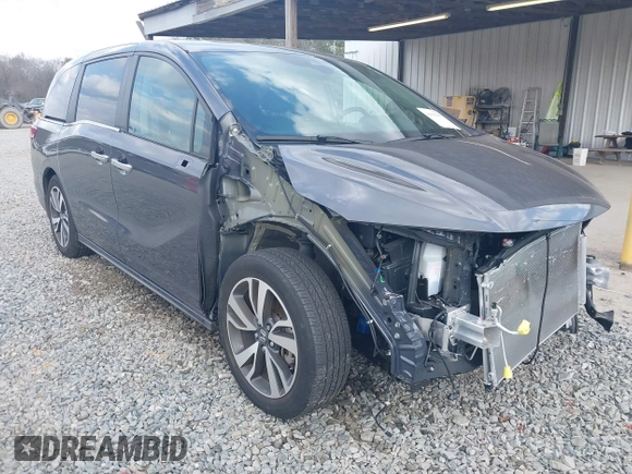 2023 Honda Odyssey Touring with VIN 5FNRL6H86PB065670, listed as a IAAI auction lot 41691093 with 22,518 mi miles and . Bid and sale history available at DreamBid. Image 1.