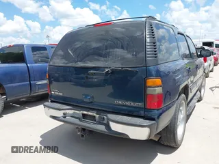2005 Chevrolet Tahoe Z71 with VIN 1GNEC13T35R205945, listed as a IAAI auction lot 42584823 with 183,432 mi miles and . Bid and sale history available at DreamBid. Image 4.