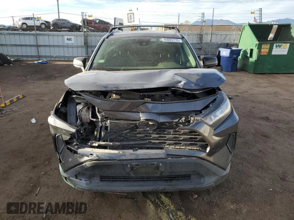 2019 Toyota RAV4 LE with VIN JTMF1RFV0KJ018803, listed as a Copart auction lot 49893715 with 77,595 mi miles and Salvage Title. Bid and sale history available at DreamBid. Image 5.