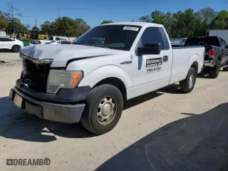 2014 Ford F-150 XL with VIN 1FTMF1CM1EKG07492, listed as a Copart auction lot 49982015 with 137,894 mi miles and Salvage Title. Bid and sale history available at carsss.com. Image 1.