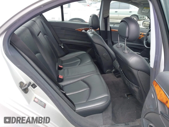 2005 Mercedes-Benz E-Class 3.2L with VIN WDBUF65J45A658795, listed as a IAAI auction lot 41923148 with 106,832 mi miles. Bid and sale history available at carsss.com. Image 8.
