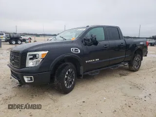 2017 Nissan Titan XD PRO-4X with VIN 1N6BA1F48HN535966, listed as a Copart auction lot 45111485 with 150,009 mi miles and Salvage Title. Bid and sale history available at carsss.com. Image 1.
