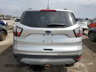 2017 Ford Escape SE with VIN 1FMCU9G94HUD89140, listed as a Copart auction lot 51699525 with 243,788 mi miles and Salvage Title. Bid and sale history available at carsss.com. Image 6.