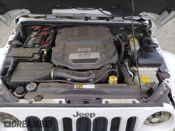 2013 Jeep Wrangler Unlimited Sahara with VIN 1C4HJWEG9DL628684, listed as a Copart auction lot 57672175 with 69,010 mi miles and Salvage title. Bid and sale history available at DreamBid. Image 12.
