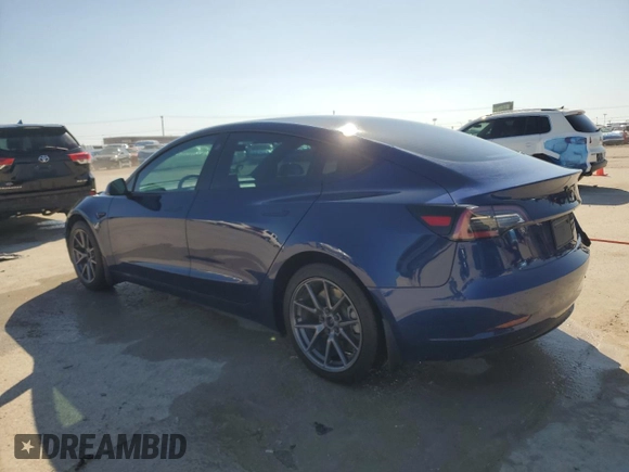 2022 Tesla Model 3 with VIN 5YJ3E1EA8NF322335, listed as a Copart auction lot 48187265 with 22,265 mi miles and Clean Title. Bid and sale history available at DreamBid. Image 2.