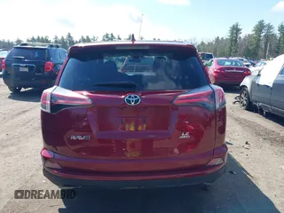 2018 Toyota RAV4 LE with VIN JTMBFREV2JD228186, listed as a IAAI auction lot 42076730 with 93,899 mi miles. Bid and sale history available at carsss.com. Image 16.