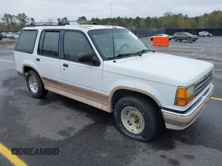 1994 Ford Explorer Eddie Bauer z VIN 1FMDU32X5RUE53856, wystawiony jako IAAI lot #41820679 z przebiegiem 231 000 mil mil oraz . Historia ofert i sprzedaży dostępna na DreamBid. Obrazek 1.