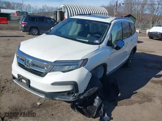 2019 Honda Pilot Touring 7-Passenger with VIN 5FNYF6H66KB073553, listed as a IAAI auction lot 41615538 with 74,882 mi miles. Bid and sale history available at carsss.com. Image 17.