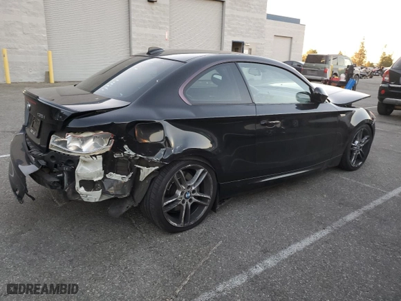 2011 BMW 1 Series 135i with VIN WBAUC9C59BVM10741, listed as a Copart auction lot 79583304 with 128,300 mi miles and Salvage Title. Bid and sale history available at carsss.com. Image 3.