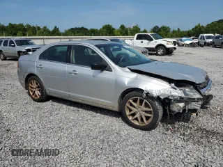 2012 Ford Fusion SEL with VIN 3FAHP0JG9CR157630, listed as a Copart auction lot 61682695 with 154,281 mi miles and Salvage title. Bid and sale history available at DreamBid. Image 4.