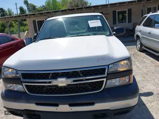 2006 Chevrolet Silverado 1500 Work Truck with VIN 1GCEC14Z86E231669, listed as a IAAI auction lot 42007021 with 160,427 mi miles. Bid and sale history available at carsss.com. Image 6.