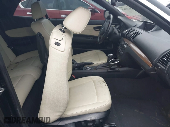 2011 BMW 1 Series 128i with VIN WBAUL7C52BVM79176, listed as a IAAI auction lot 41387249 with 99,145 mi miles and . Bid and sale history available at carsss.com. Image 5.
