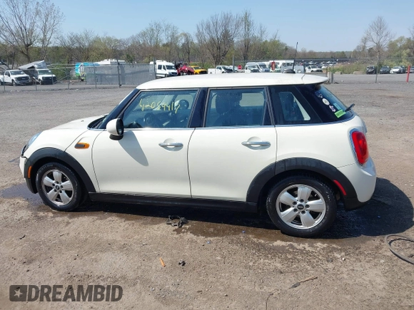 2015 MINI Hardtop 4 Door with VIN WMWXS5C53FT832742, listed as a IAAI auction lot 42059417 with 114,671 mi miles and . Bid and sale history available at DreamBid. Image 14.