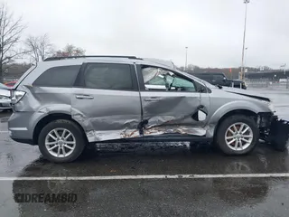 2016 Dodge Journey SXT with VIN 3C4PDDBG7GT173158, listed as a IAAI auction lot 42020182 with 159,136 mi miles. Bid and sale history available at carsss.com. Image 13.