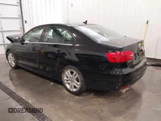 2014 Volkswagen Jetta SE with VIN 3VWD07AJ3EM437025, listed as a IAAI auction lot 42189870 with 96,530 mi miles and . Bid and sale history available at DreamBid. Image 3.