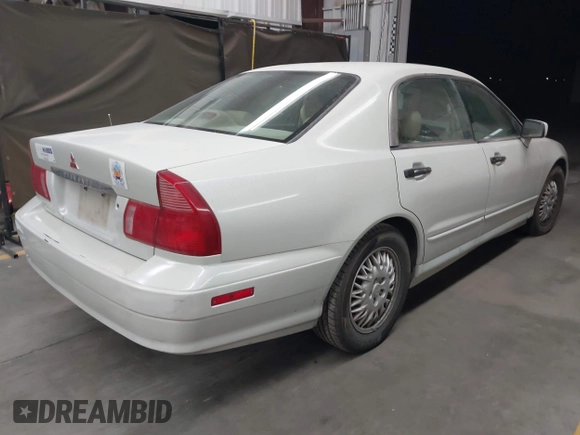 1999 Mitsubishi Diamante z VIN 6MMAP47P4XT003895, wystawiony jako IAAI lot #41992452 z przebiegiem 170 964 mil mil oraz . Historia ofert i sprzedaży dostępna na DreamBid. Obrazek 4.