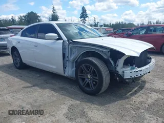 2014 Dodge Charger SXT z VIN 2C3CDXHG6EH267131, wystawiony jako IAAI lot #42321246 z przebiegiem 95 385 mil mil oraz . Historia ofert i sprzedaży dostępna na DreamBid. Obrazek 1.