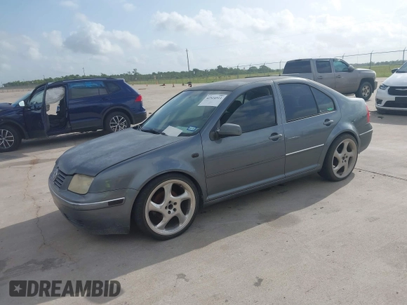 2004 Volkswagen Jetta GL with VIN 3VWRK69MX4M082958, listed as a IAAI auction lot 42524511 with 276,577 mi miles and . Bid and sale history available at DreamBid. Image 2.