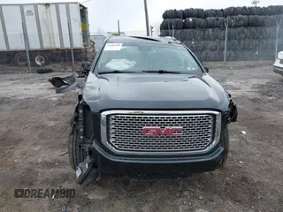 2016 GMC Yukon XL Denali with VIN 1GKS2HKJ8GR406450, listed as a IAAI auction lot 41661050 with 125,830 mi miles. Bid and sale history available at carsss.com. Image 13.