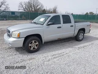 2006 Dodge Dakota SLT with VIN 1D7HW48N06S605938, listed as a IAAI auction lot 41669424 with 193,069 mi miles. Bid and sale history available at carsss.com. Image 2.