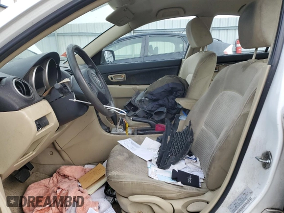 2005 Mazda 3 i with VIN JM1BK12F851282187, listed as a Copart auction lot 45145815 with 219,920 mi miles and Salvage Title. Bid and sale history available at DreamBid. Image 7.
