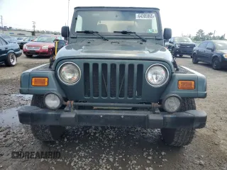 2003 Jeep Wrangler Sahara with VIN 1J4FA59S73P308250, listed as a Copart auction lot 64305965 with 186,288 mi miles and Clean title. Bid and sale history available at DreamBid. Image 5.