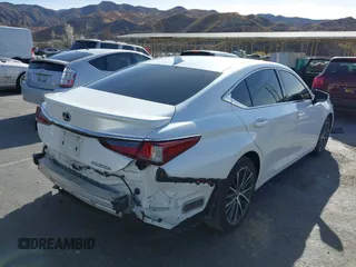 2023 Lexus ES with VIN 58ADA1C19PU036009, listed as a IAAI auction lot 41198635 with 42,074 mi miles. Bid and sale history available at carsss.com. Image 4.
