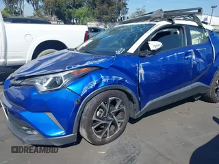 2019 Toyota C-HR XLE with VIN JTNKHMBX5K1043079, listed as a IAAI auction lot 41813367 with 77,879 mi miles and . Bid and sale history available at DreamBid. Image 18.