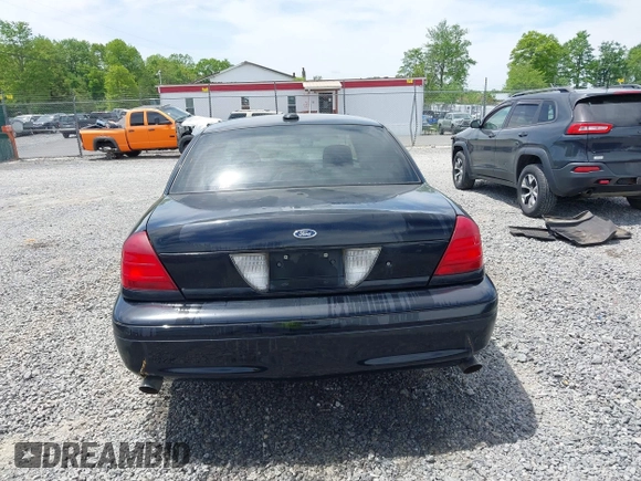 2005 Ford Police Interceptor z VIN 2FAHP71WX5X158807, wystawiony jako IAAI lot #42282107 z przebiegiem 153 787 mil mil oraz . Historia ofert i sprzedaży dostępna na DreamBid. Obrazek 16.