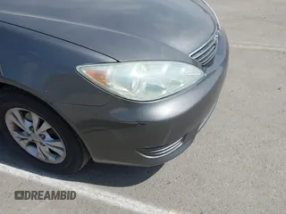 2005 Toyota Camry LE with VIN 4T1BF32K35U590150, listed as a IAAI auction lot 42053337 with 180,627 mi miles and . Bid and sale history available at DreamBid. Image 6.