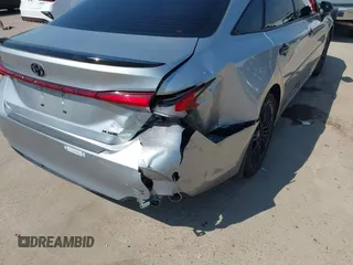 2021 Toyota Avalon XSE Nightshade z VIN 4T1EZ1FB6MU069666, wystawiony jako IAAI lot #41684183 z przebiegiem 75 320 mil mil oraz . Historia ofert i sprzedaży dostępna na DreamBid. Obrazek 6.