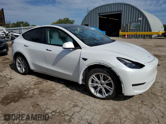2023 Tesla Model Y Long Range with VIN 7SAYGAEE6PF795434, listed as a Copart auction lot 67507984 with 24,469 mi miles and Salvage Title. Bid and sale history available at DreamBid. Image 4.