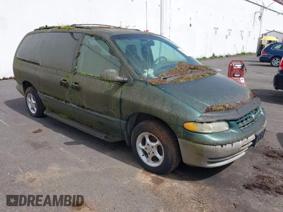 1999 Plymouth Voyager Grand SE z VIN 1P4GP44G0XB579719, wystawiony jako IAAI lot #41981925 z przebiegiem 163 940 mil mil oraz . Historia ofert i sprzedaży dostępna na DreamBid. Obrazek 1.