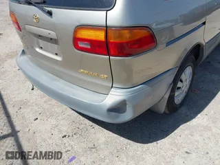 2000 Toyota Sienna CE with VIN 4T3ZF19C6YU263755, listed as a IAAI auction lot 41858870 with 190,171 mi miles. Bid and sale history available at carsss.com. Image 12.
