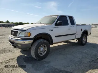 2000 Ford F-150 XL z VIN 1FTRX18L4YNA07118, wystawiony jako Copart lot #60167645 z przebiegiem Nie podano mil oraz Czysty tytuł • Clean title. Historia ofert i sprzedaży dostępna na DreamBid. Obrazek 1.
