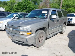 2003 Chevrolet Tahoe LS with VIN 1GNEC13V43J308143, listed as a IAAI auction lot 42015589 with 280,289 mi miles. Bid and sale history available at carsss.com. Image 2.