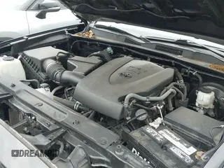 2020 Toyota Tacoma SR5 with VIN 3TMCZ5AN1LM306362, listed as a IAAI auction lot 42086958 with 67,682 mi miles and . Bid and sale history available at DreamBid. Image 19.