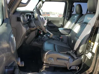 2022 Jeep Wrangler Unlimited Sport with VIN 1C4HJXDG4NW206622, listed as a Copart auction lot 47971005 with 62,240 mi miles and Salvage Title. Bid and sale history available at DreamBid. Image 7.