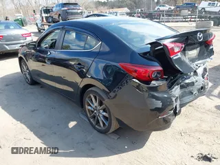 2018 Mazda 3 Touring with VIN 3MZBN1V34JM261565, listed as a IAAI auction lot 41795238 with 121,112 mi miles. Bid and sale history available at carsss.com. Image 3.