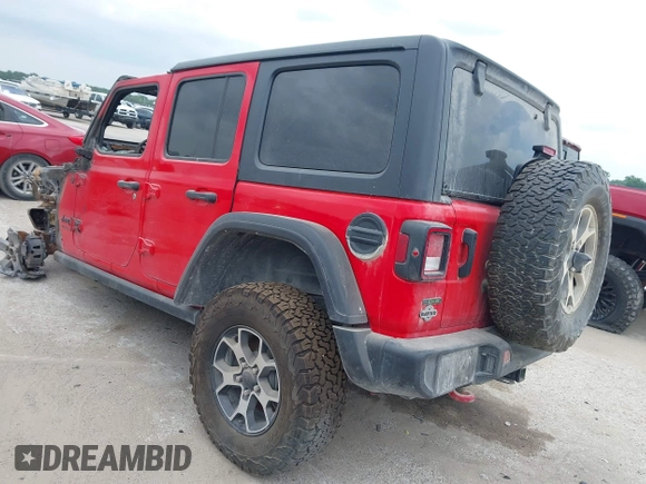 2021 Jeep Wrangler Unlimited Rubicon with VIN 1C4JJXFM1MW830218, listed as a IAAI auction lot 39934037 with Not provided miles and . Bid and sale history available at DreamBid. Image 3.