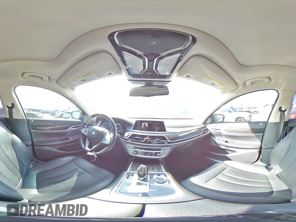 2017 BMW 7 Series 740i with VIN WBA7E2C50HG739565, listed as a Copart auction lot 64584885 with 114,496 mi miles and Salvage title. Bid and sale history available at DreamBid. Image 14.