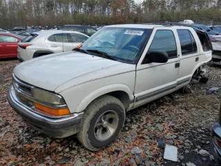 2001 Chevrolet Blazer LT z VIN 1GNCS13W612198738, wystawiony jako Copart lot #80969694 z przebiegiem 299 569 mil mil oraz Szkoda całkowita • Salvage title. Historia ofert i sprzedaży dostępna na DreamBid. Obrazek 1.