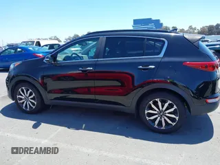 2019 Kia Sportage EX with VIN KNDPN3AC2K7602435, listed as a IAAI auction lot 42233427 with 58,730 mi miles and . Bid and sale history available at DreamBid. Image 14.
